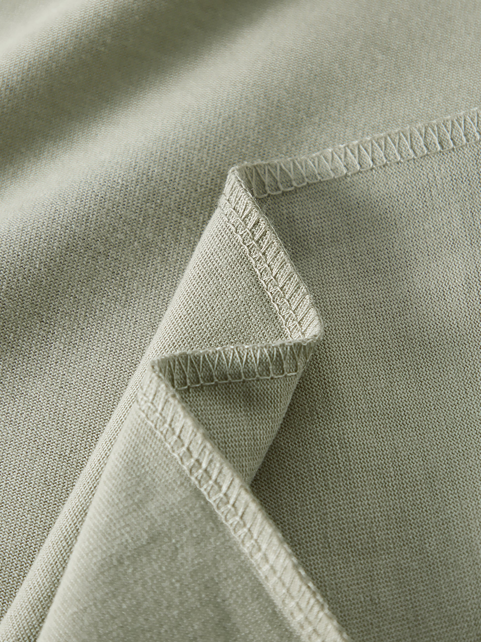 Crossxnails WearGood oversized unisex t-shirt close-up on soft fabric, ideal for Christian streetwear UK, shop online Ipswich.