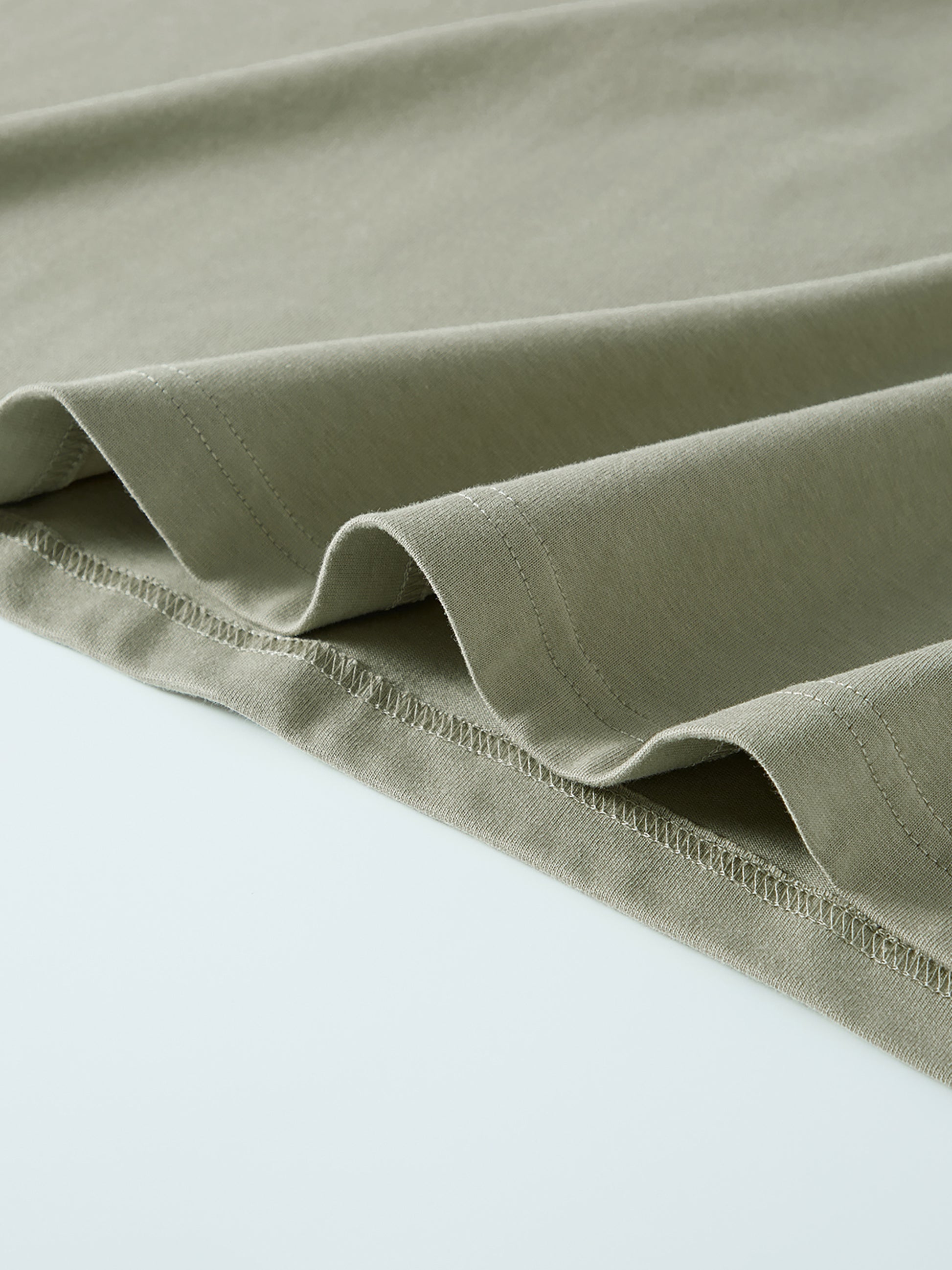 Crossxnails WearGood oversized unisex t-shirt fabric close-up, soft cotton detail for Christian streetwear UK online shop.